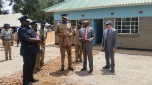 Simbi Phiri with Malawi's top cop after donating a Police Station